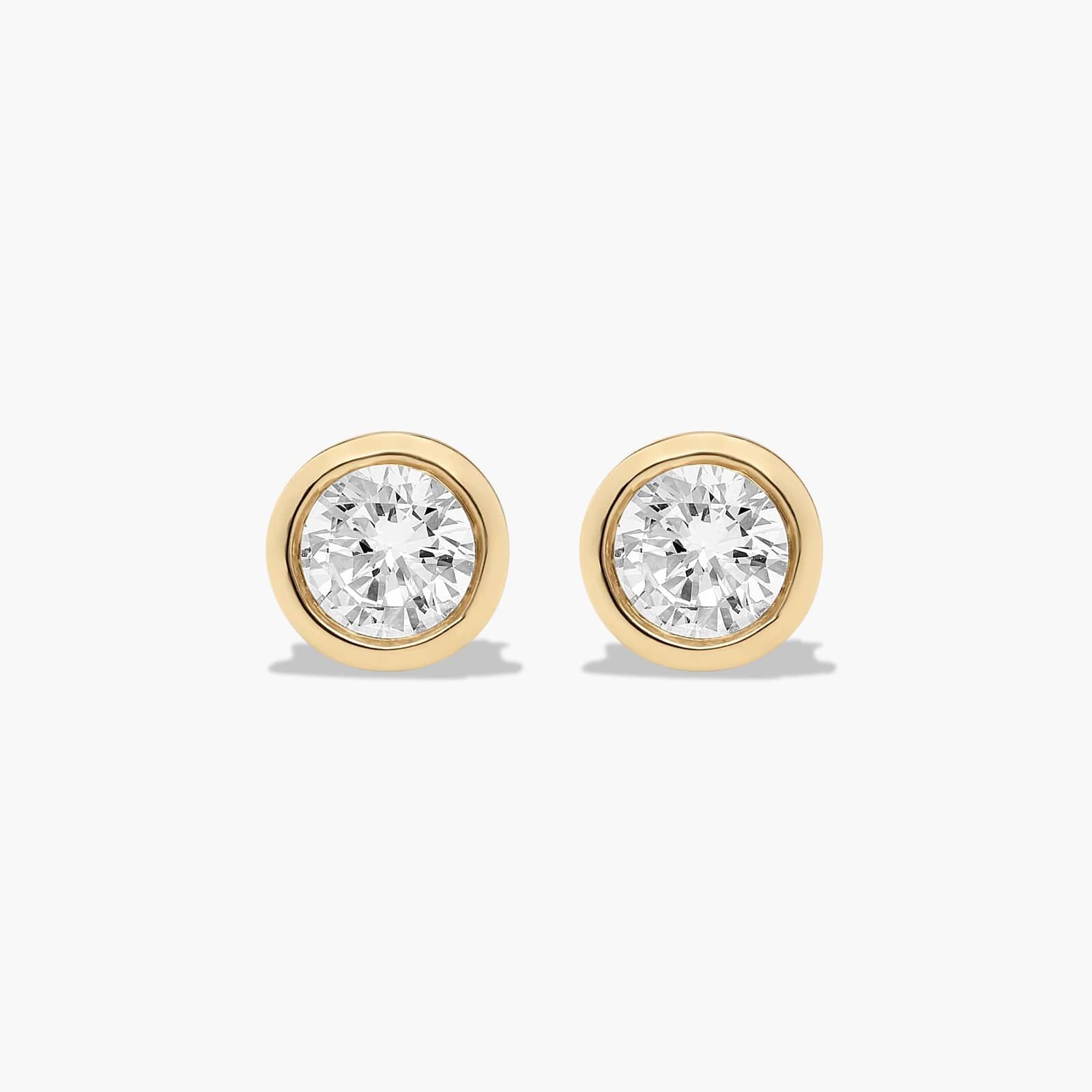 Bezel 0.25 CTW Diamond Stud Earrings In 14K Yellow Gold