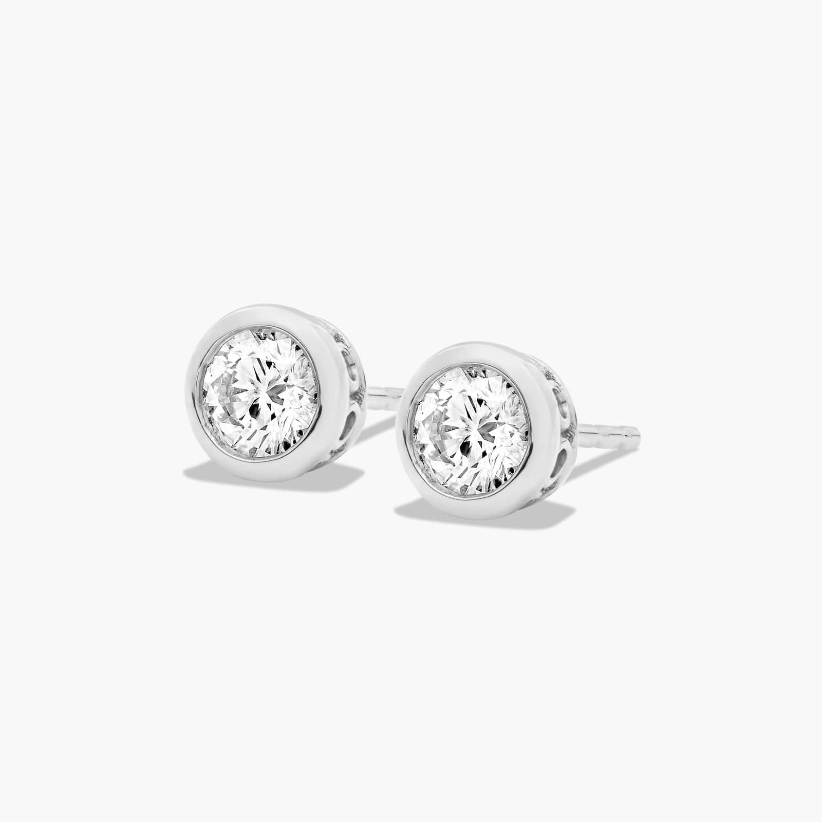Bezel 0.5 CTW Diamond Stud Earrings In 14K White Gold