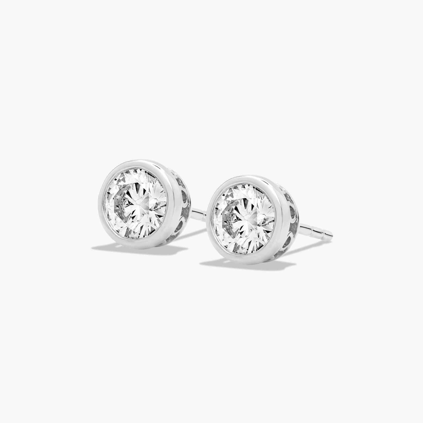 Bezel 0.75 CTW Diamond Stud Earrings In 14K White Gold