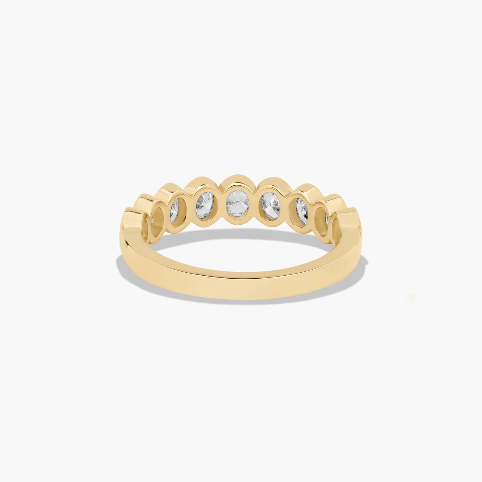 Bezel Set Wedding Ring With Oval Cut Diamonds In 18K Yellow Gold (2.00mm)