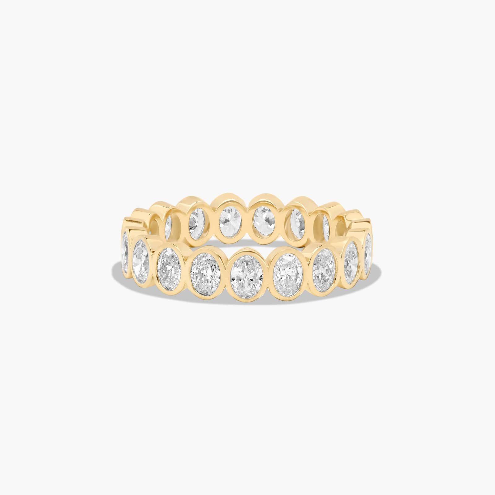 Bezel Set Eternity Ring With Oval Cut Diamonds In 14K Yellow Gold (4.50mm)