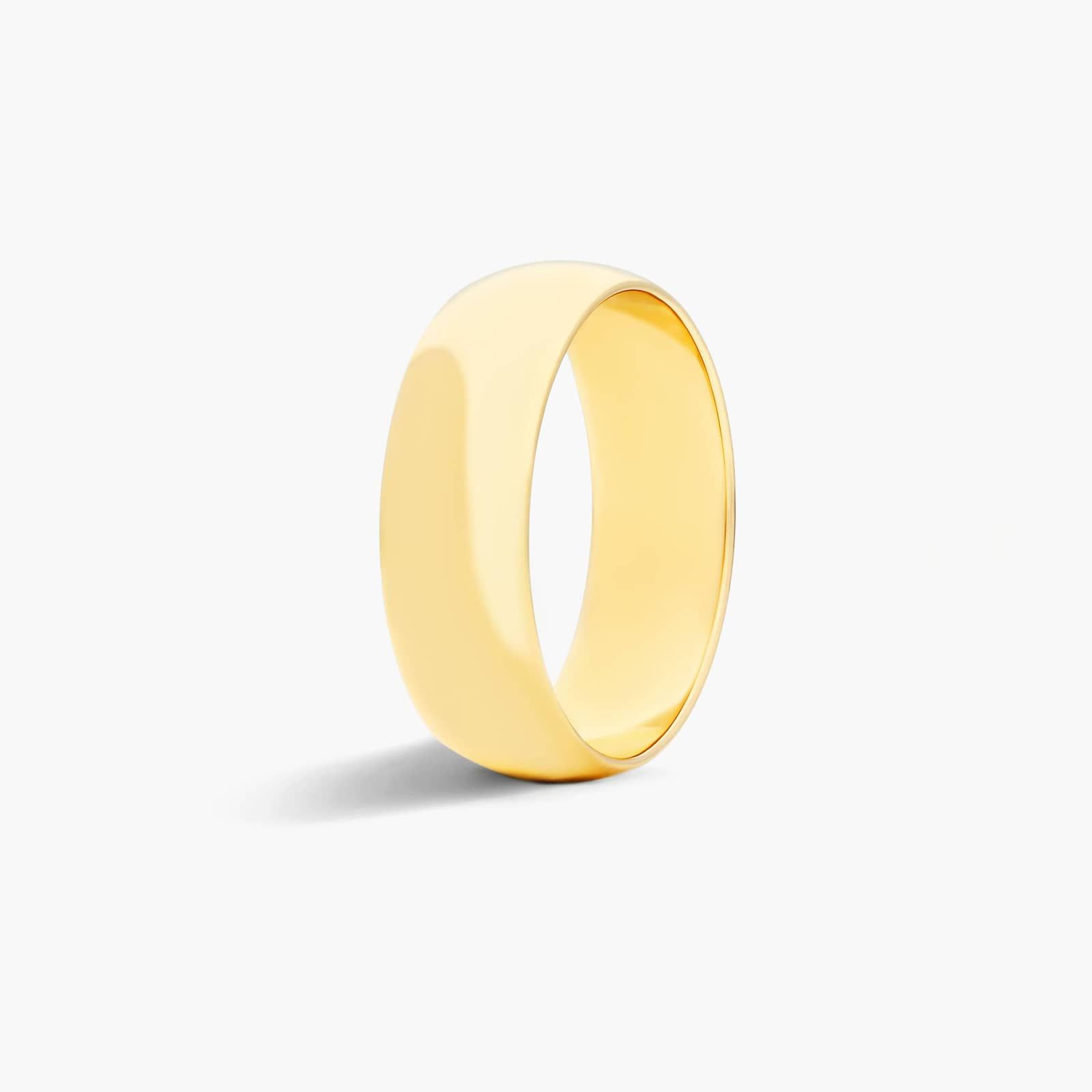 Traditional Slightly Curved Wedding Band In 18K Yellow Gold (7.00mm)
