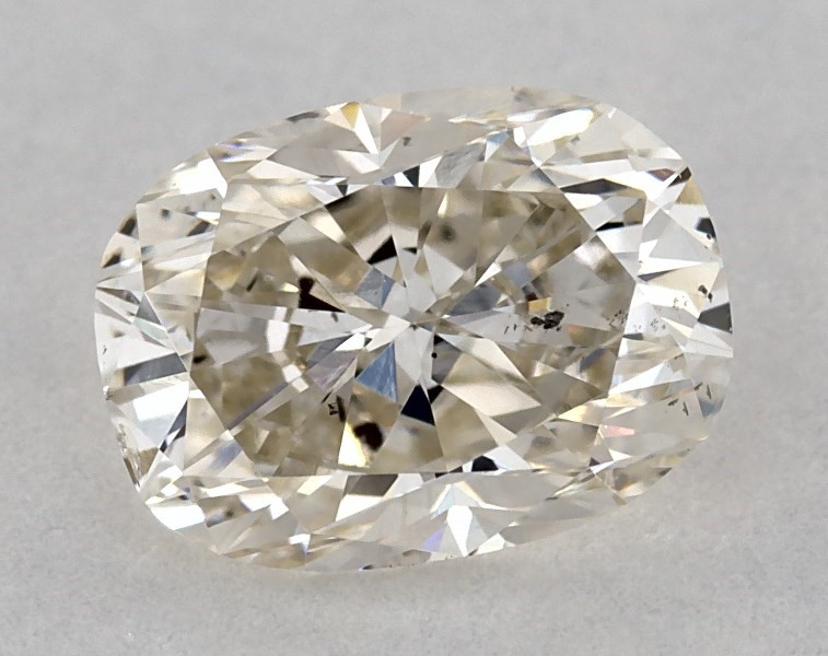 0.59 carat cushion diamond, K SI2